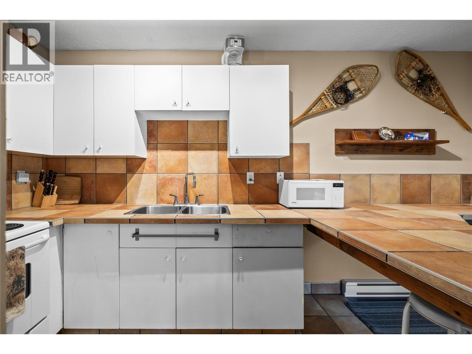 6375 Whiskey Jack Road Unit# 308. Big White, British Columbia