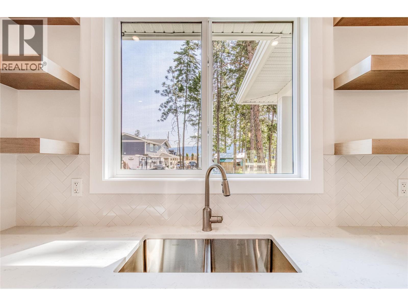 7186 Dunwaters Road. Kelowna, British Columbia