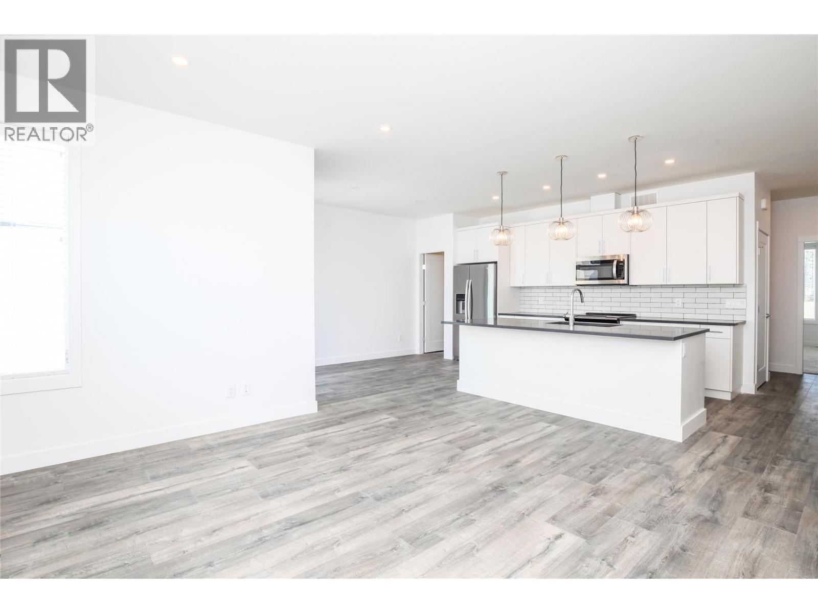 610 Academy Way Unit# 114. Kelowna, British Columbia