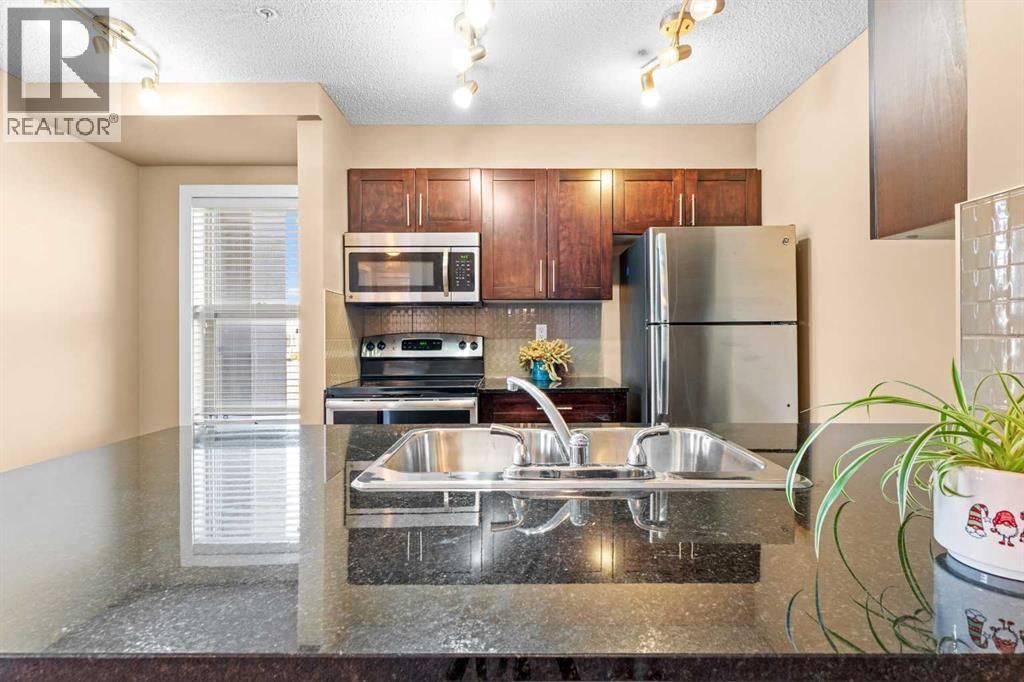 7202, 403 Mackenzie Way Sw, Airdrie