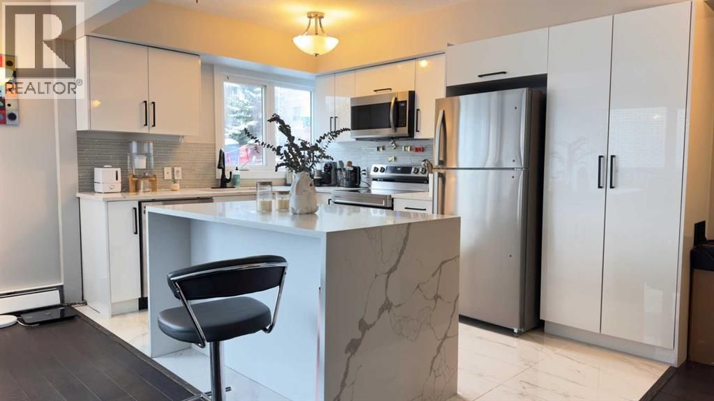 104, 1508 23 Avenue Sw, Calgary