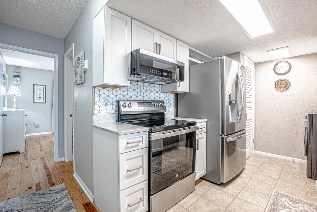 13 of 64 - 6909 N Lagoon Drive Unit E2, Panama City Beach, FL