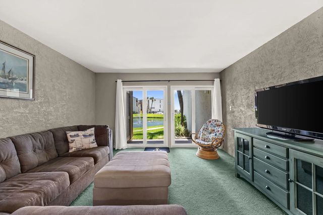 8727 Thomas Drive Unit E8, Panama City Beach.