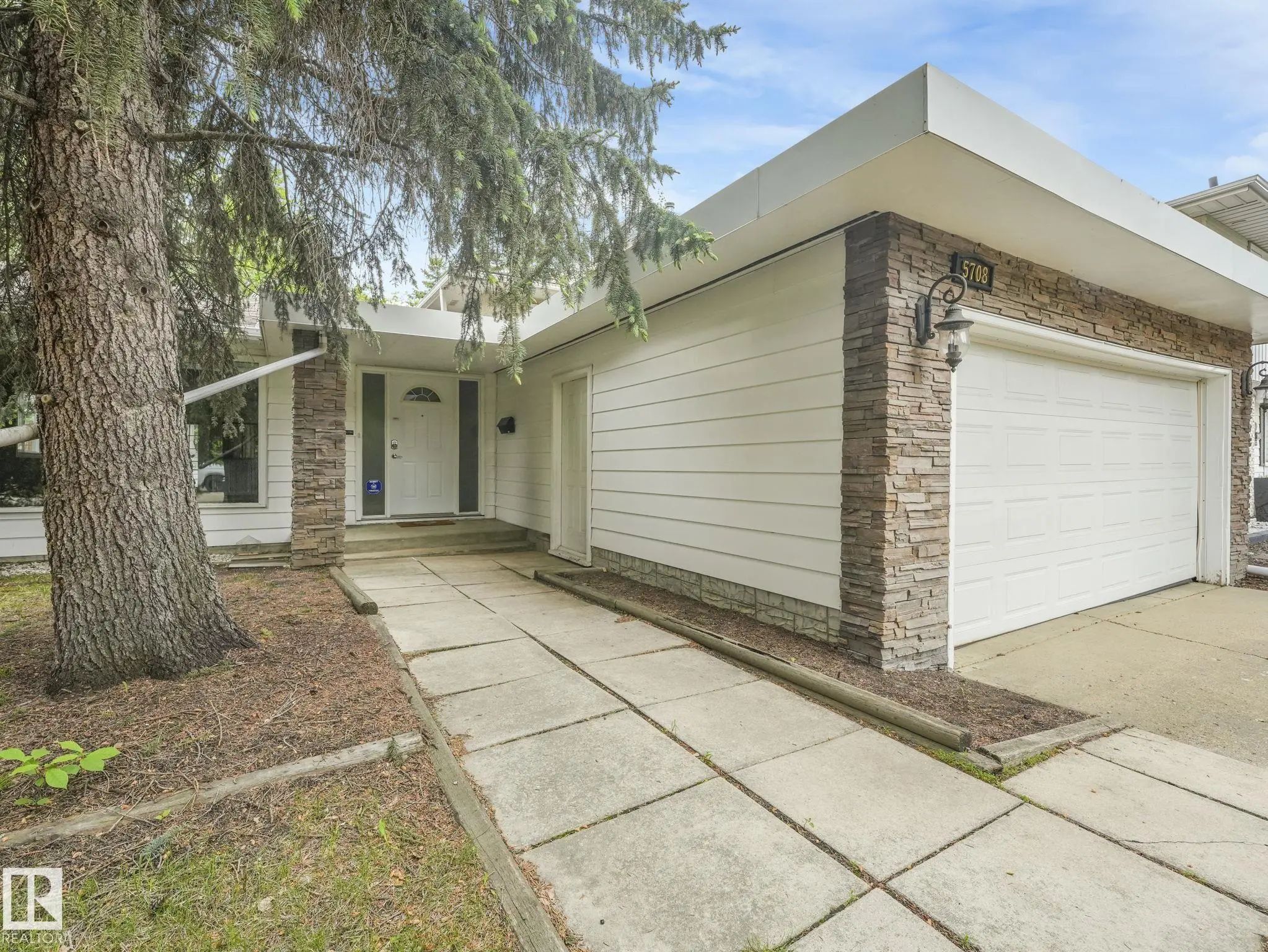 Photo for MLS®# E4506927 - home for sale at 5708 144 Street Northwest, Brookside, Edmonton AB