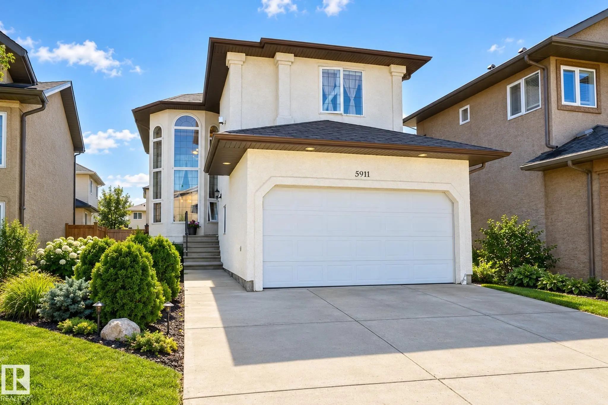 Photo for MLS®# E4504986 - home for sale at 5911 166 Avenue Northwest, Hollick-Kenyon, Edmonton AB
