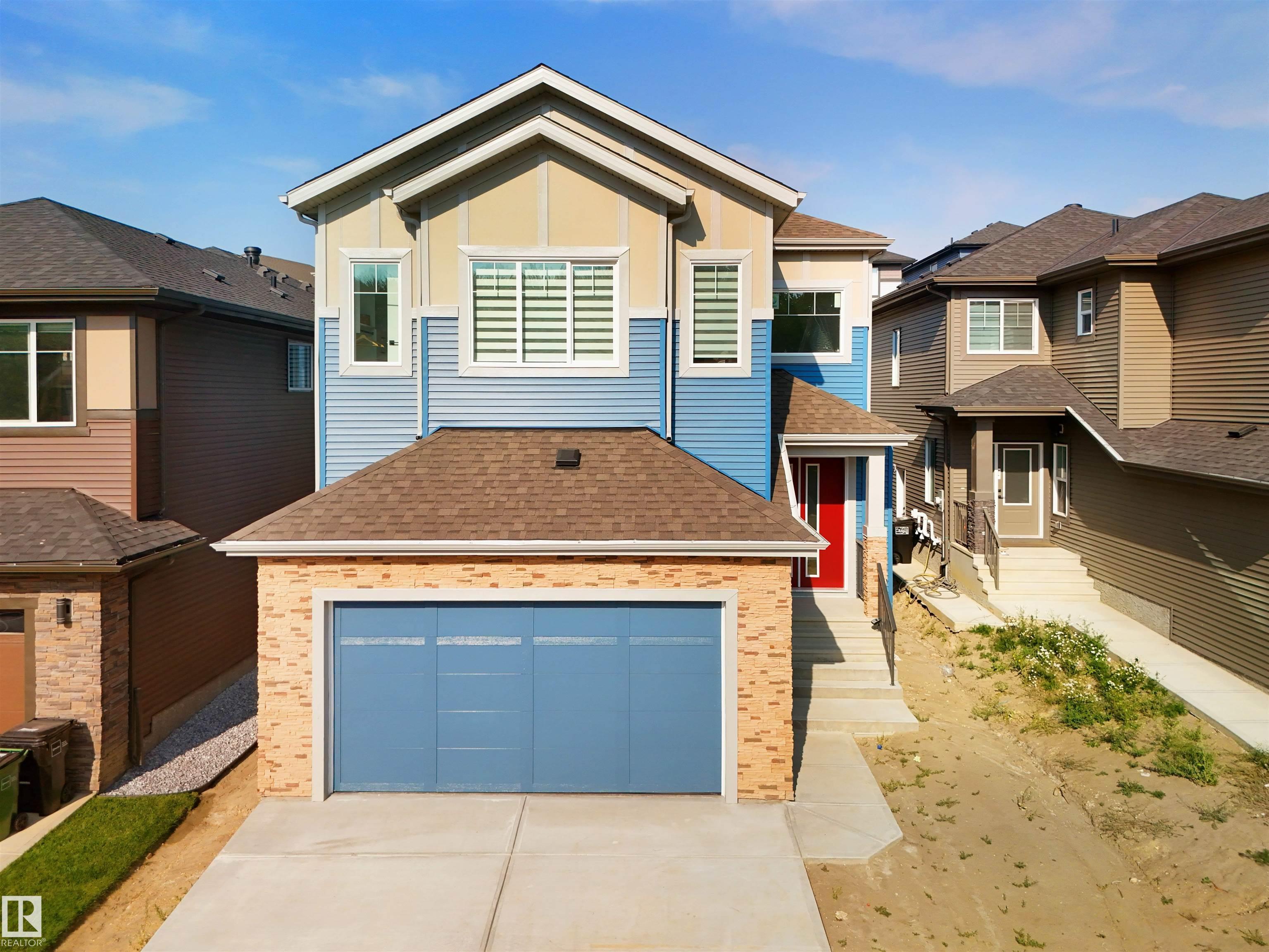 Photo for MLS®# E4464537 - home for sale at 1160 Gyrfalcon Crescent Northwest, Hawks Ridge, Edmonton AB