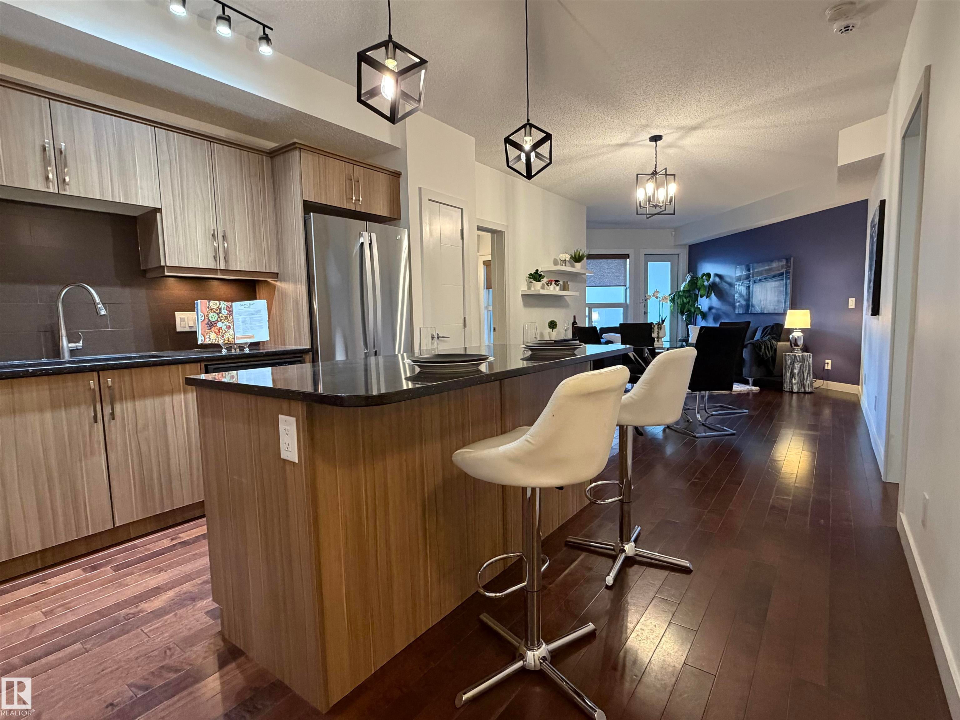 Photo for MLS®# E4476607 - home for sale at 115 10523 123 Street Northwest, Westmount, Edmonton AB