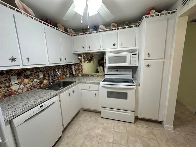 2 of 30 - 3180 Holiday Springs Blvd 107, Pompano Beach, FL