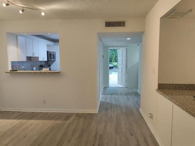 1 of 57 - 2601 S Course Dr 107, Pompano Beach, FL