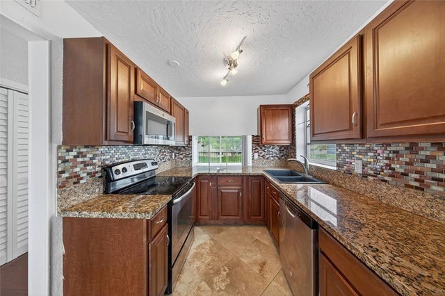 1 of 33 - 6070 Nw 64th Ave 212, Tamarac, FL