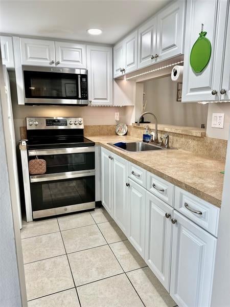 3 of 35 - 9201 Lime Bay Blvd 214, Tamarac, FL
