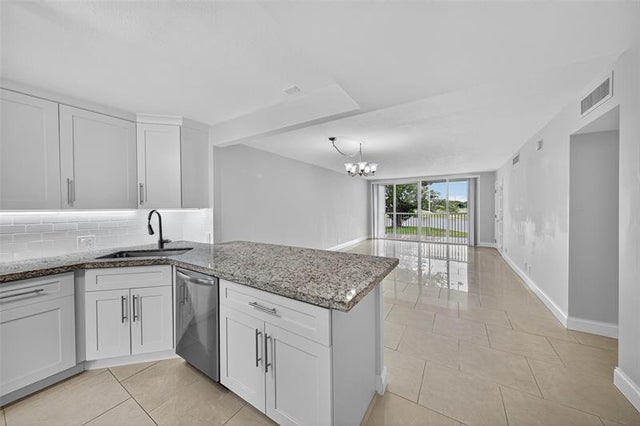 2 of 56 - 3090 N Course Dr 211, Pompano Beach, FL