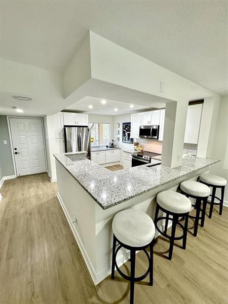 1 of 18 - 2208 S Cypress Bend Dr 308, Pompano Beach, FL
