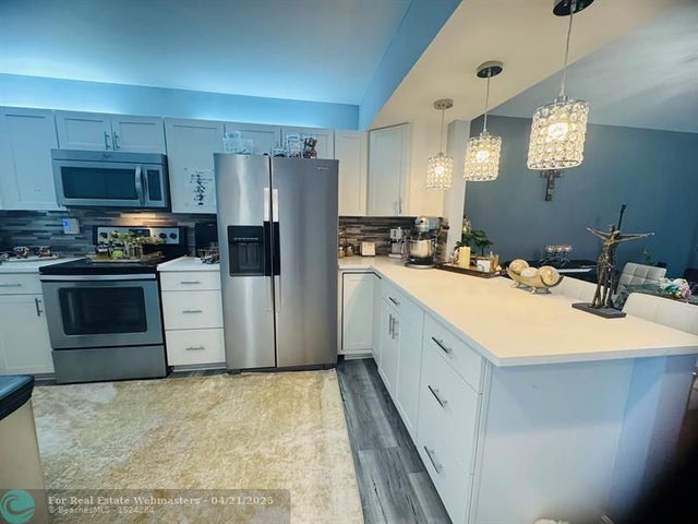 4 of 67 - 2400 Deer Creek Country Club Blvd 207, Deerfield Beach, FL