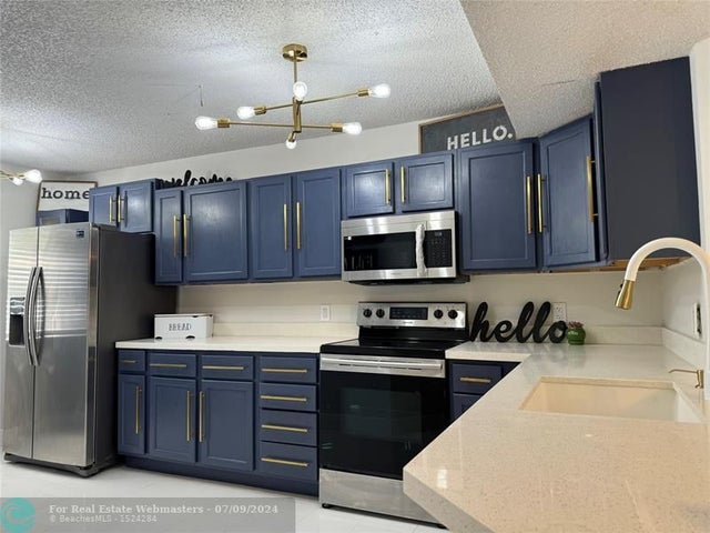 1 of 32 - 8891 Wiles Rd 208, Coral Springs, FL