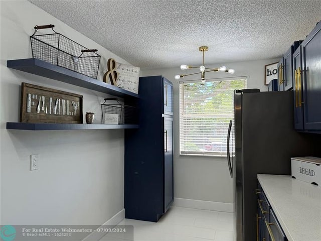 3 of 32 - 8891 Wiles Rd 208, Coral Springs, FL