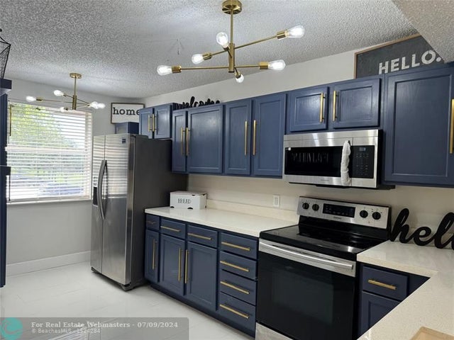 4 of 32 - 8891 Wiles Rd 208, Coral Springs, FL