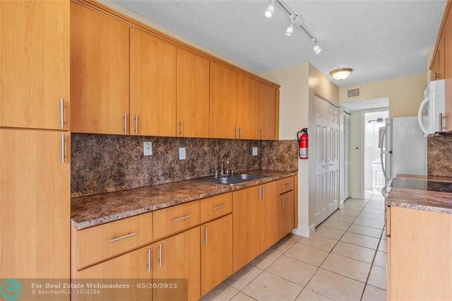 1 of 28 - 3550 Blue Lake Dr 105, Pompano Beach, FL