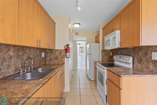 2 of 28 - 3550 Blue Lake Dr 105, Pompano Beach, FL