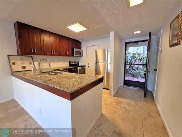 2 of 20 - 2320 S Cypress Bend Dr 106, Pompano Beach, FL