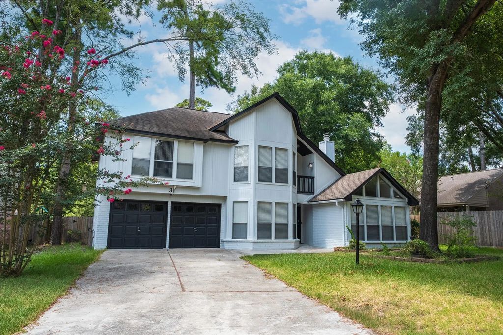 31 N Drifting Leaf Court, The Woodlands