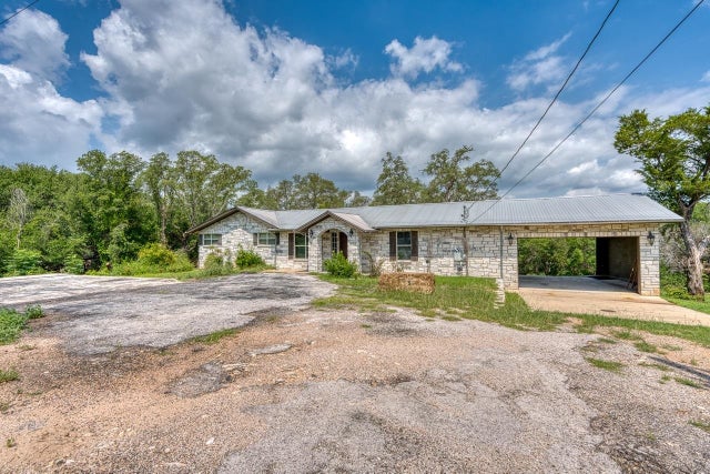 Lake LBJ Homes for Sale located at 105 Mesquite Bend, in the city of Kingsland, TX 78639