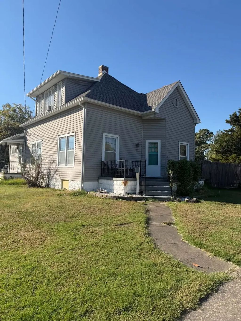 301 N State Street, Christopher