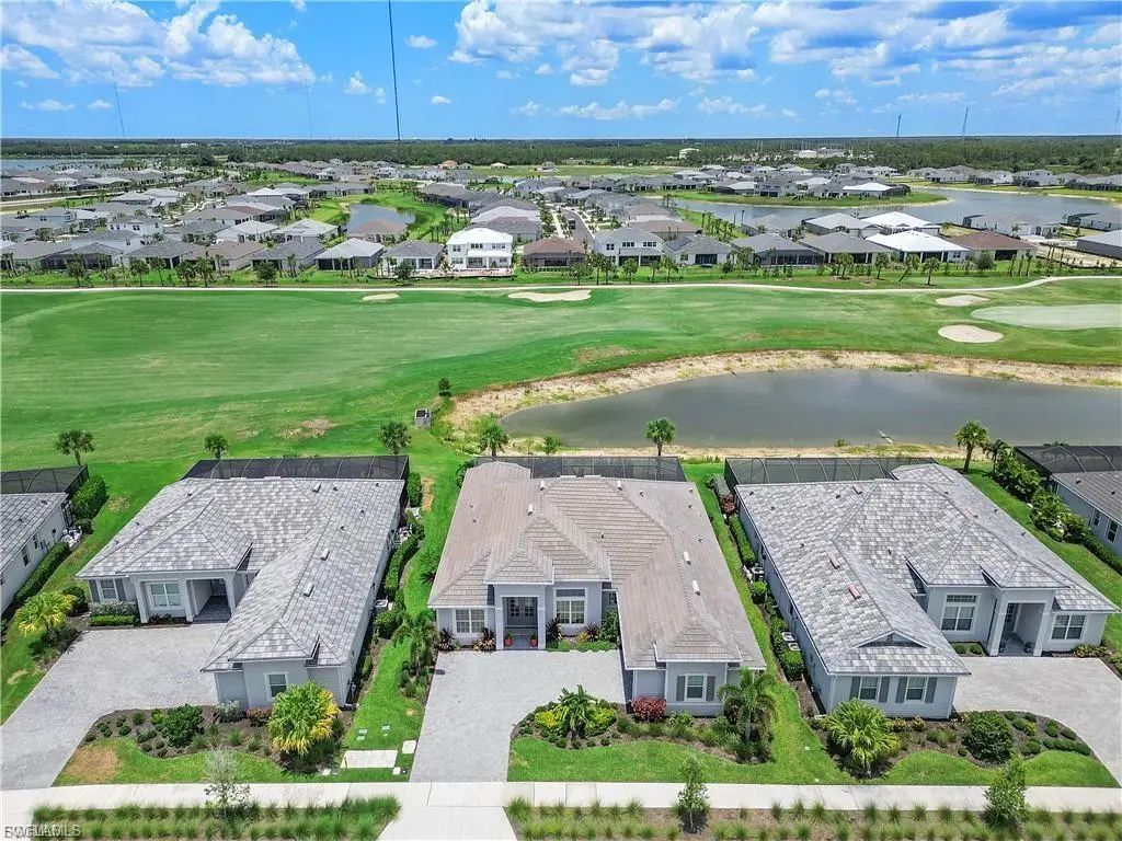 Aerial view of 15880 Talon Terrace on the lake and golf course at Babcock National in Babcock Ranch, Florida