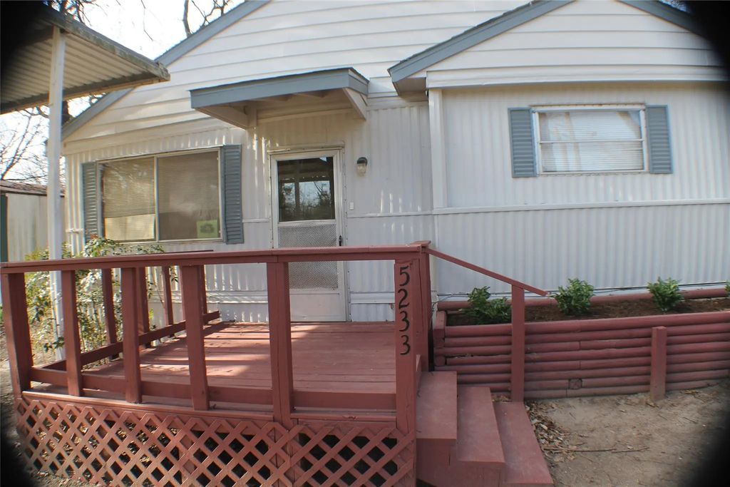 5233 Sam Houston, Log Cabin
