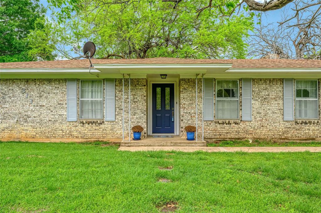 311 N Britton Street, Tom Bean