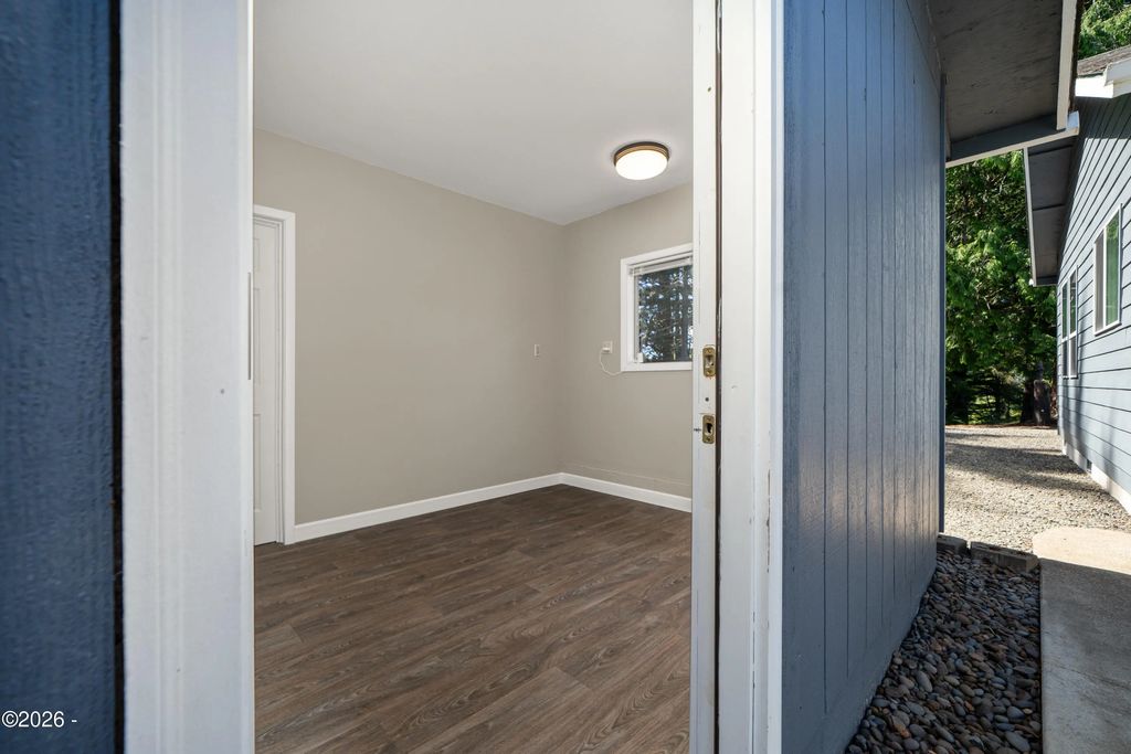 Detached two car garage with finished studio at 6039 S Bay Road, Toledo, Oregon