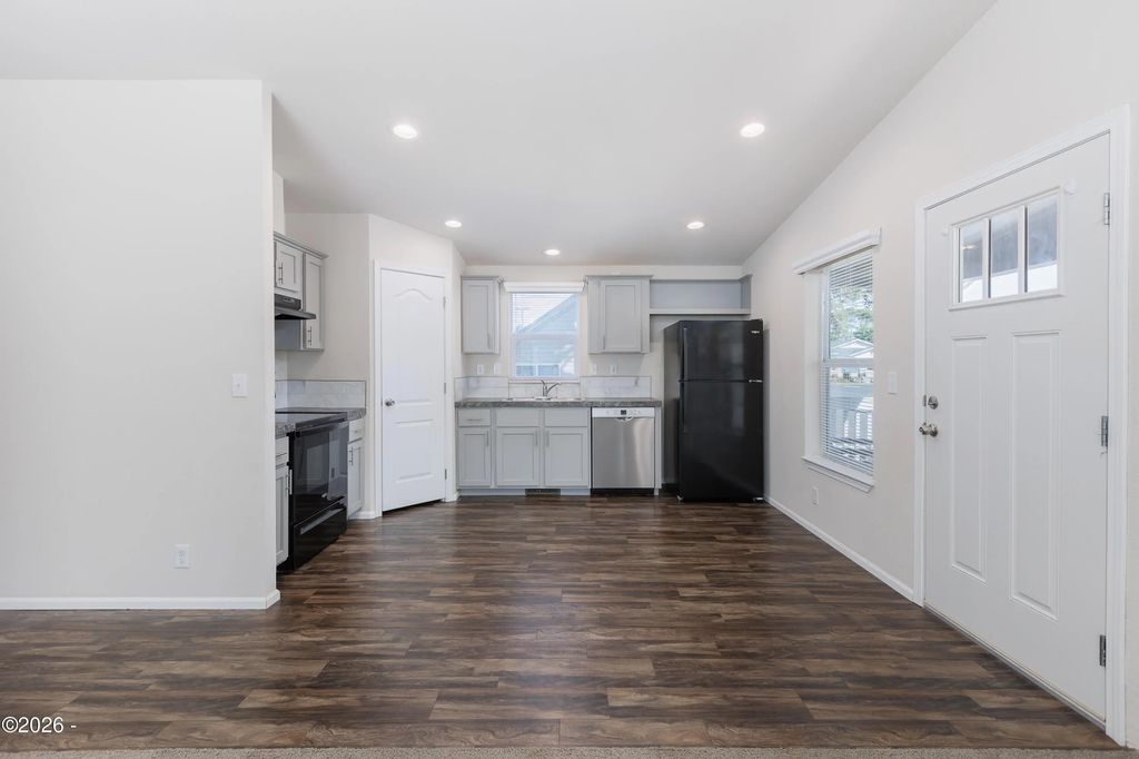 Living area and kitchen at 440 N Bay Street, Waldport, Oregon