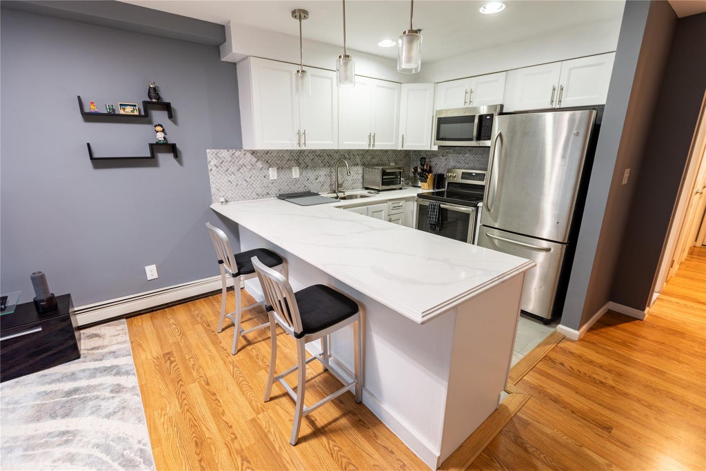 1 of 13 - 106 Atlantic Avenue # #18, Lynbrook, NY
