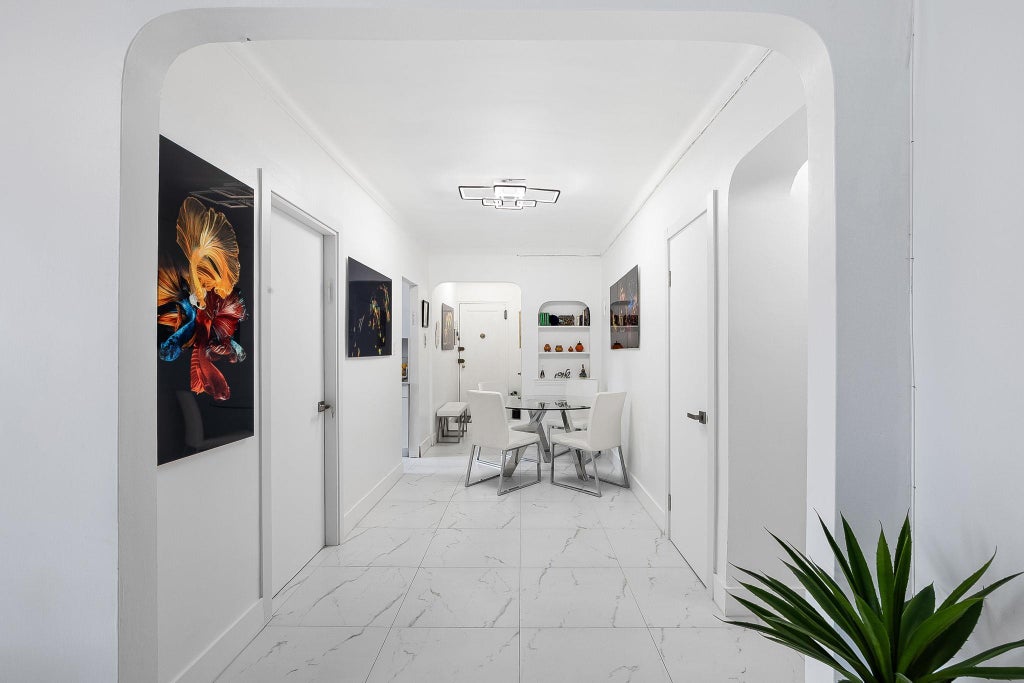 3 of 14 - 99-31 64 Avenue # E10, Rego Park, NY