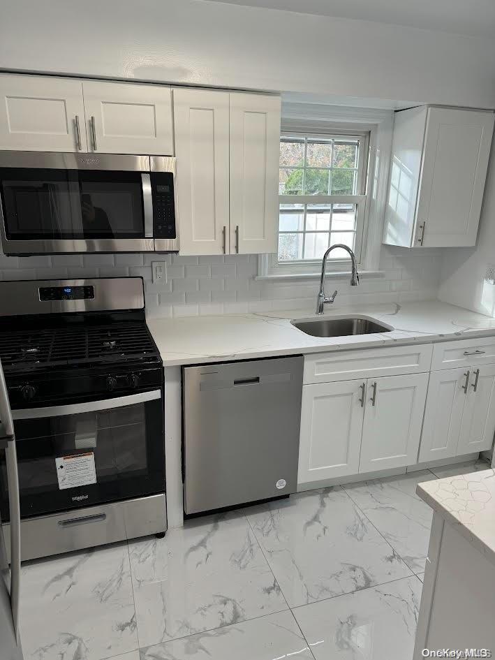 4 of 14 - 933 Surrey Drive, East Meadow, NY