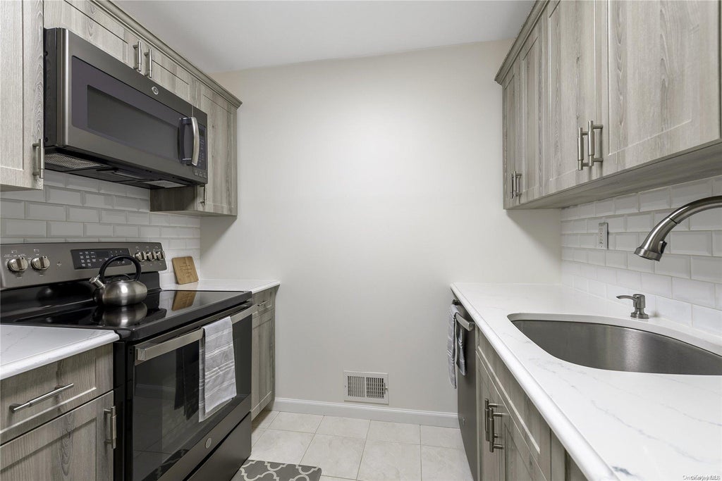 1 of 1 - 54 School St. # 318, Westbury, NY