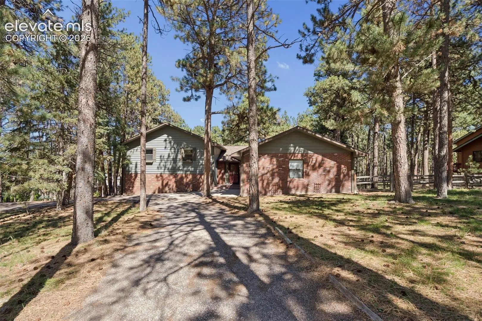 MLS Number 9643383 in the city of Monument Homes for Sale by Woodmoor Lode, the zipcode of 80132