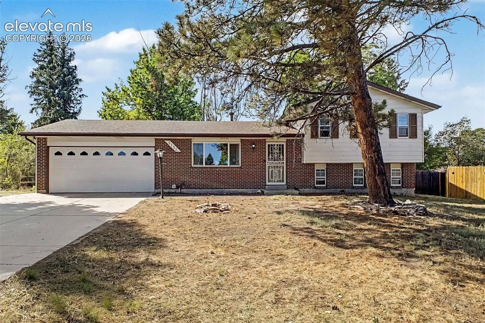 MLS Number 6779319 in the city of Colorado Springs Homes for Sale by Village Heights, the zipcode of 80917