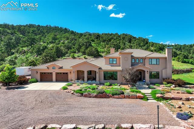 14250 Aiken Ride View, in the city of Colorado Springs Real Estate in CO by Turkey Canon Ranch Estates