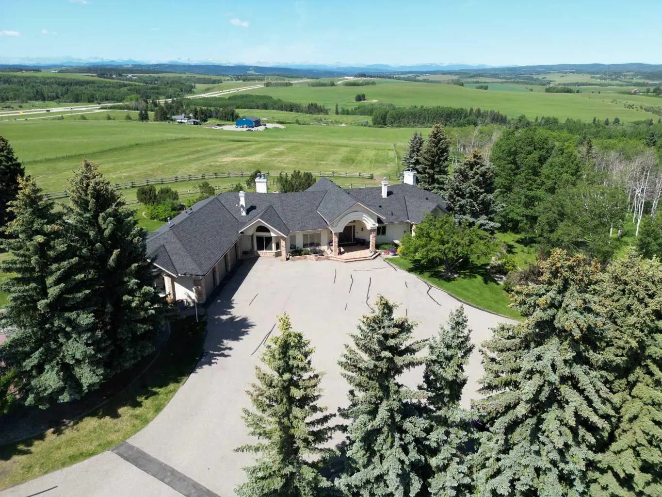 100, 182029 174 Avenue W, Priddis