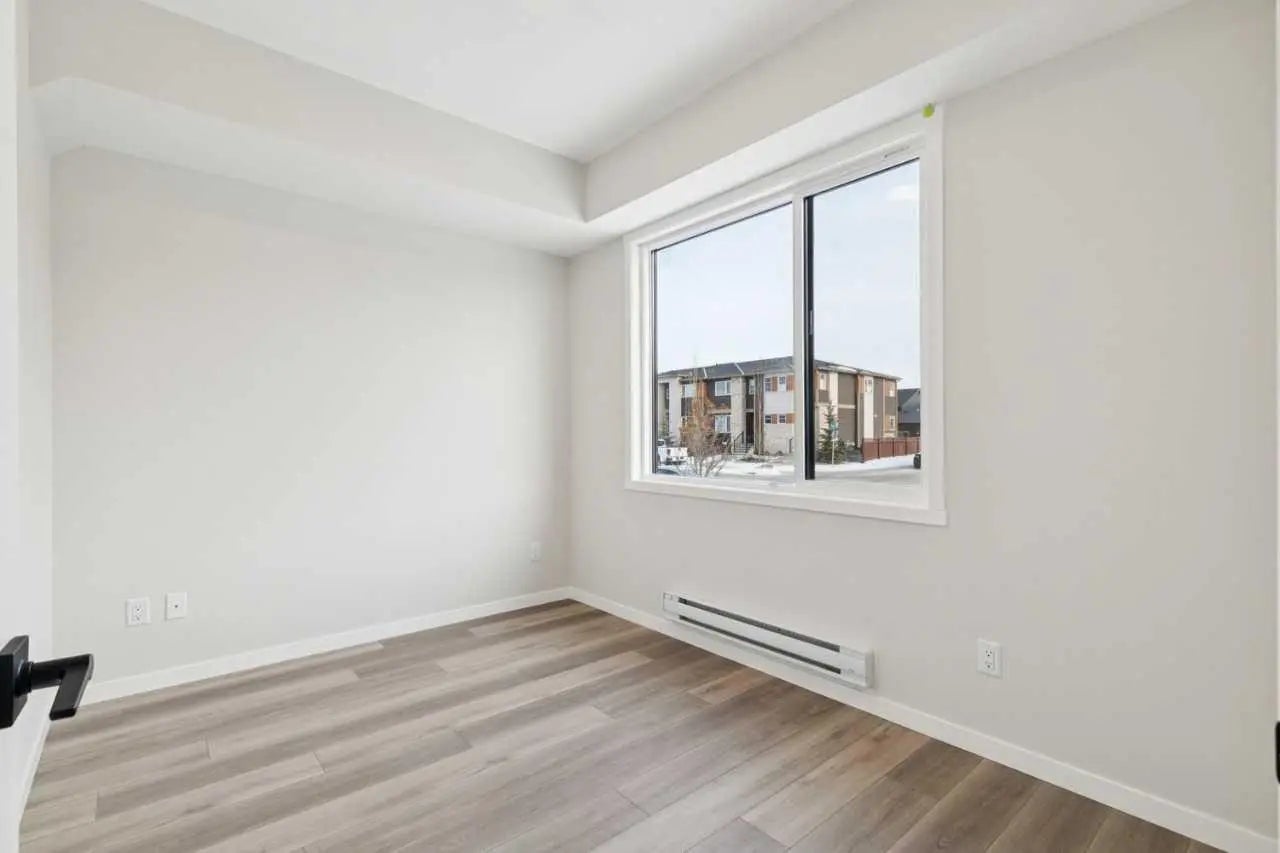 704, 81 Midtown Boulevard Southwest, Airdrie – Residential Row/Townhouse Listing Photo 4