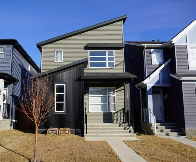 Photo for MLS®# A2280594 - home for sale at 168 Belmont Villas Southwest, Belmont, Calgary Alberta