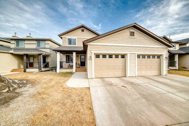 Photo for MLS®# A2283452 - home for sale at 304, 2384 Sagewood Gate Southwest, Sagewood, Airdrie Alberta