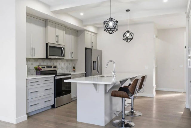 Photo for MLS®# A2288118 - home for sale at 304 Creekrun Crescent Southwest, Cobblestone Creek, Airdrie Alberta