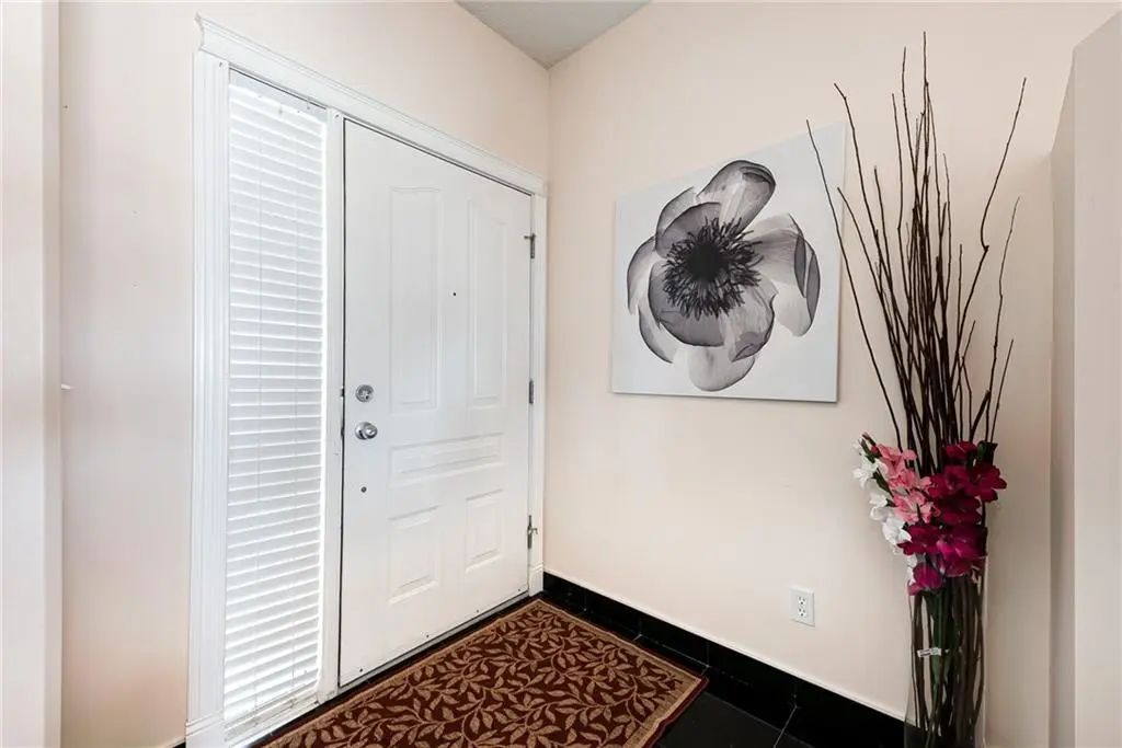 144 Rocky Vista Terrace Northwest, Calgary – Residential Row/Townhouse Listing Photo 4