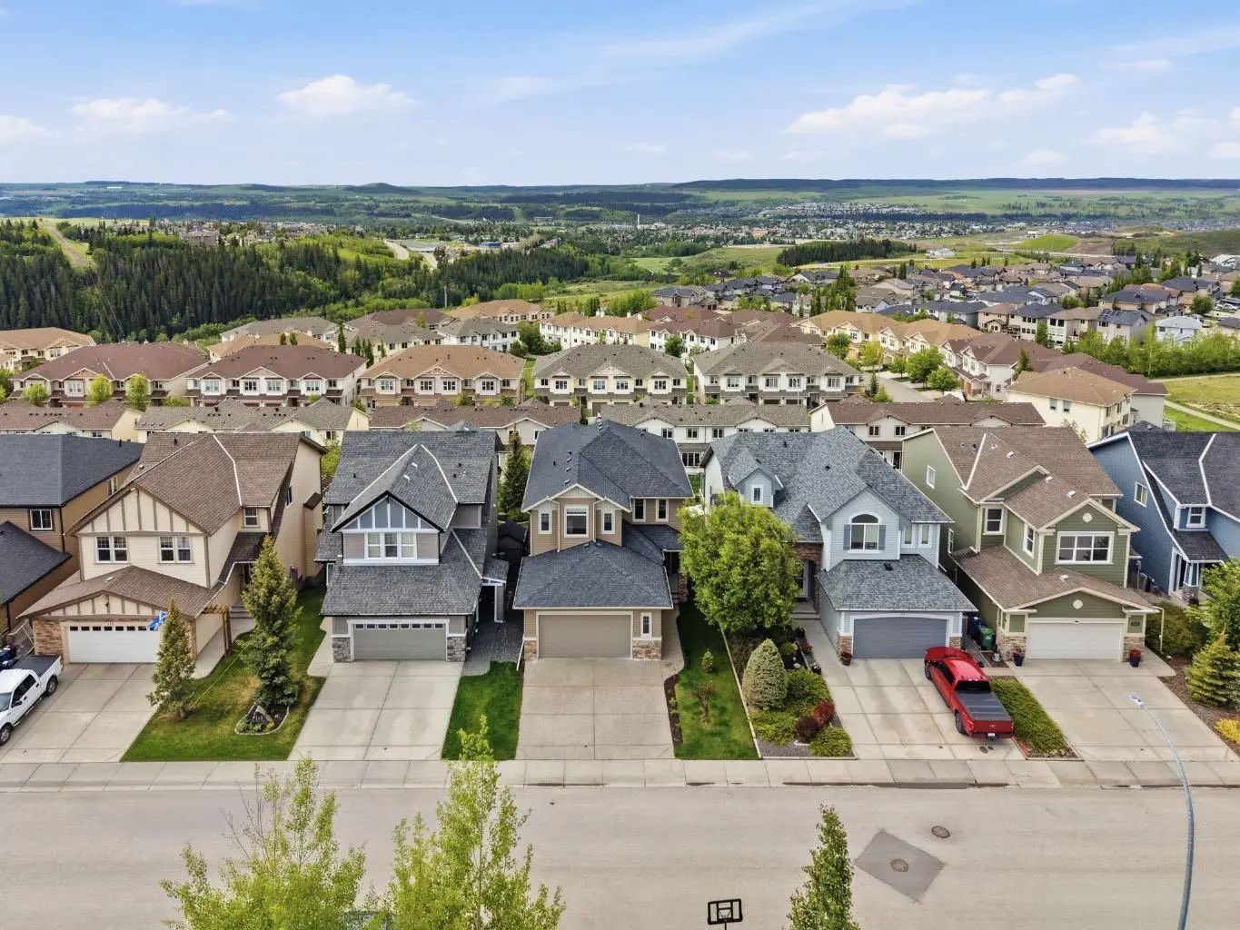 Photo for MLS®# A2320979 - home for sale at 139 Sunset View , Sunset Ridge, Cochrane Alberta