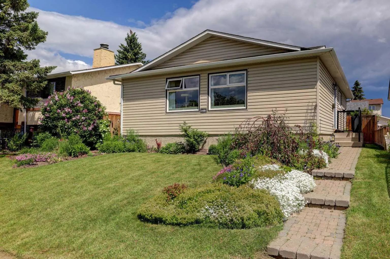 Photo for MLS®# A2322193 - home for sale at 148 Rundlecairn Rise Northeast, Rundle, Calgary Alberta