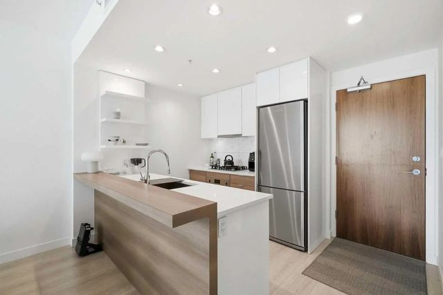 303 138 Waterfront Court Sw, Calgary