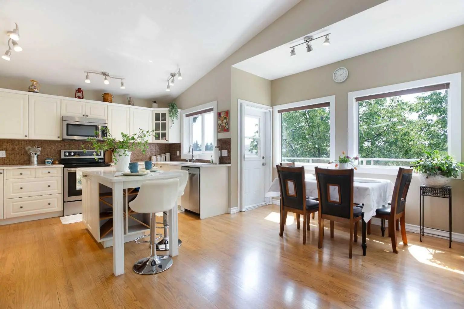 Photo for MLS®# A2331494 - home for sale at 128 Waterstone Place Southeast, Waterstone, Airdrie Alberta