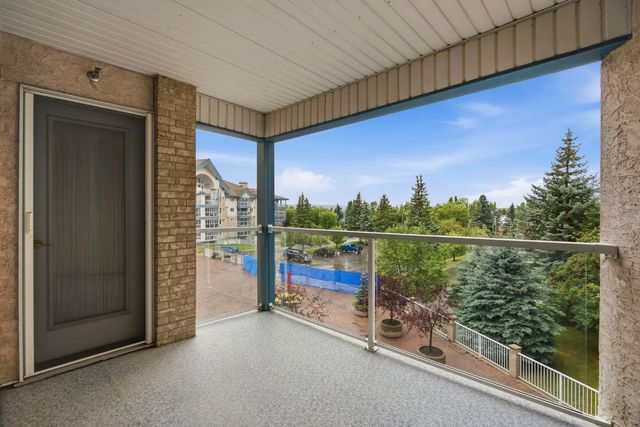 306 7239 Sierra Morena Boulevard Sw, Calgary